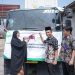 Direktur PT. BMS, Sukainah didampingi PJ Bupati Cilacap, Awaluddin Muuri menggunting pita pada kontainer sebagai tanda pelepasan ekspor perdana ikan layur beku ke Tiongkok.