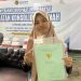 Marlisa Ermiati usai menerima Sertipikat Konsolidasi Tanah dari Menteri ATR/Kepala BPN, Nusron Wahid, di Kelurahan Susukan, Kabupaten Semarang, Provinsi Jawa Tengah pada Kamis (27/02/2025). (ISTIMEWA)